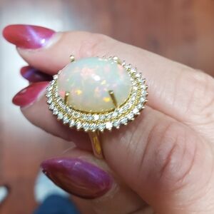 Elegant Gold Opal Ring with Diamond Accents